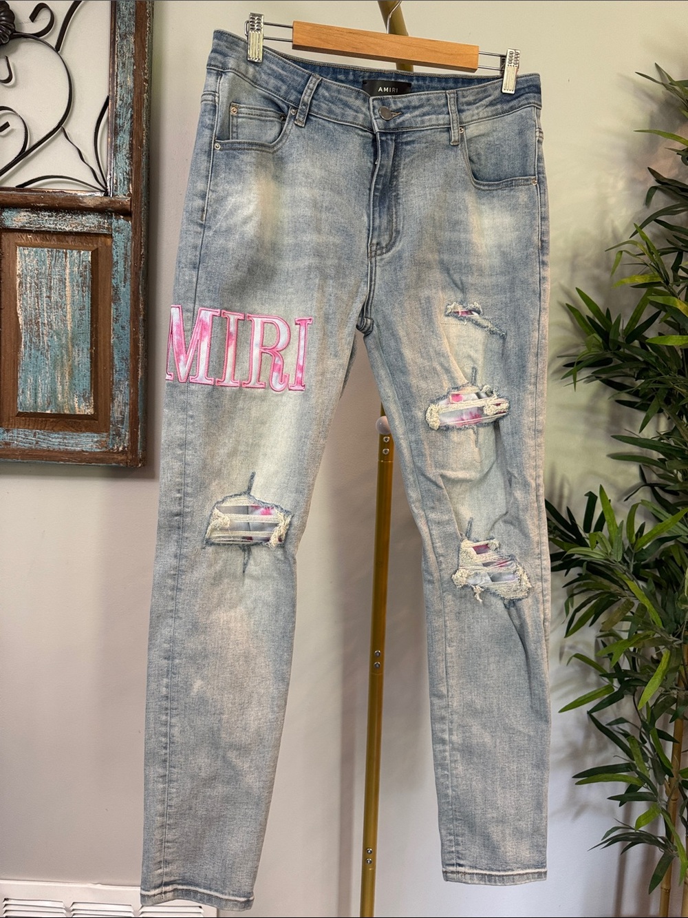 AMIRI Light Wash Distressed Skinny Jeans with Pink Logo EUC 34